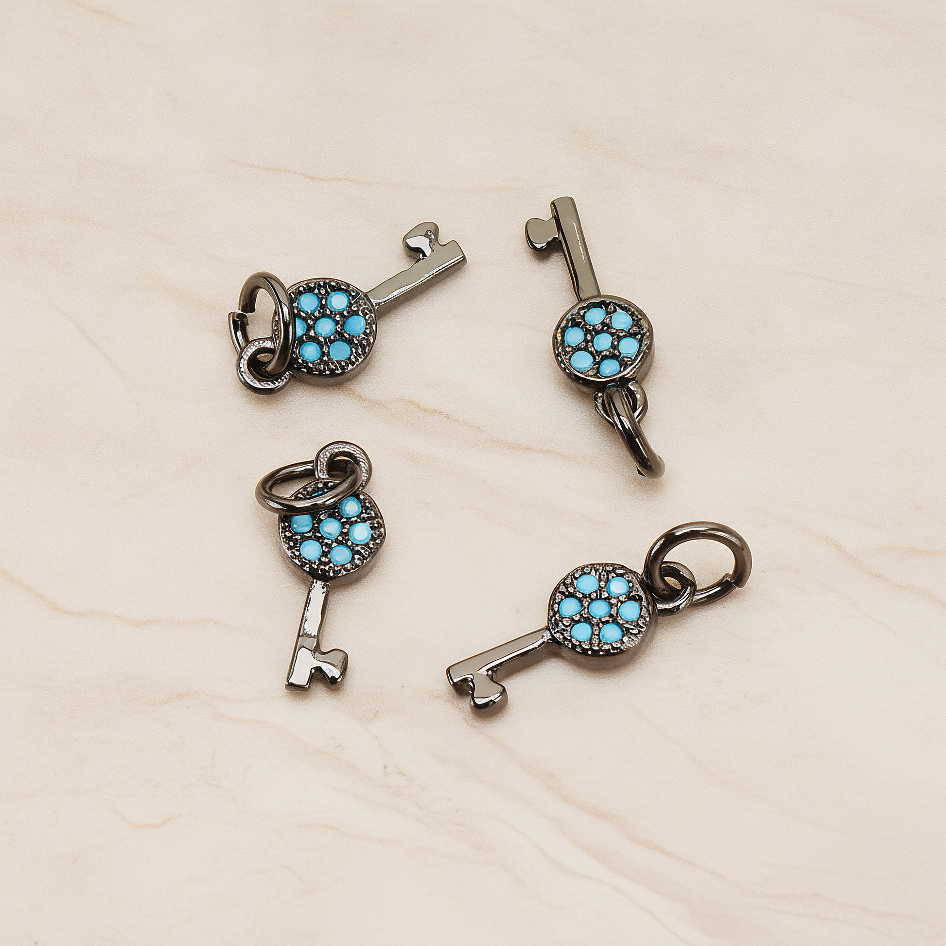 Mint Cubic Zirconia Setting Key Pendant, 1 Pc on warm marble background (PD.1699)