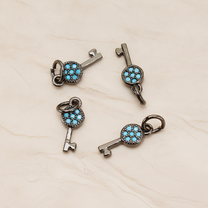Mint Cubic Zirconia Setting Key Pendant, 1 Pc on warm marble background (PD.1699)