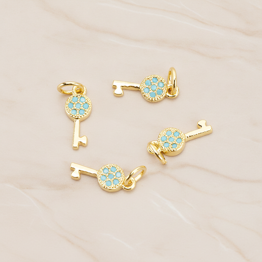 Mint Cubic Zirconia Setting Key Pendant, 1 Pc on warm marble background (PD.1699)