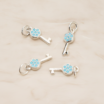 Mint Cubic Zirconia Setting Key Pendant, 1 Pc on warm marble background (PD.1699)