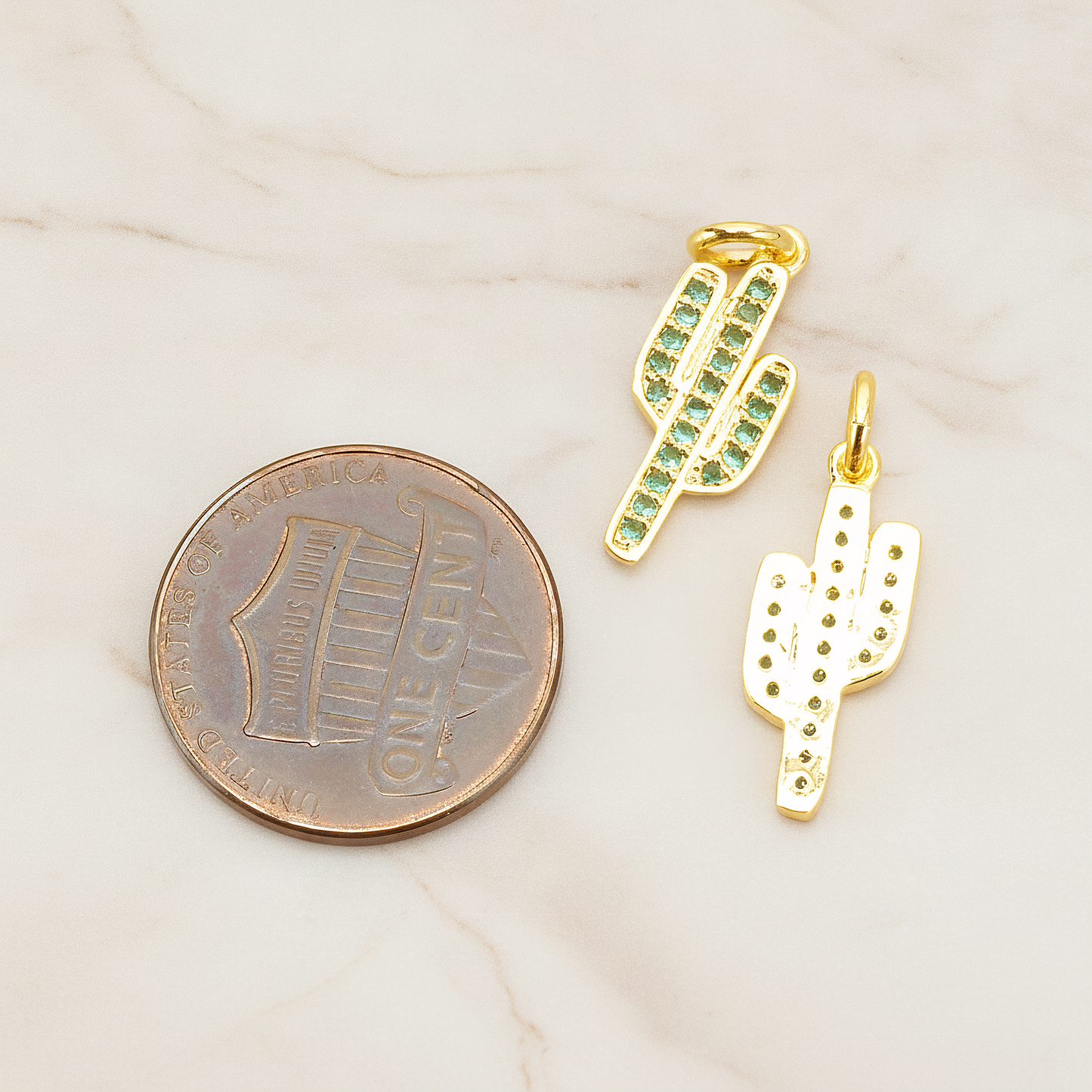 Green Cubic Zirconia Setting Cactus Pendant, 1 Pc on warm marble background (PD.1700)