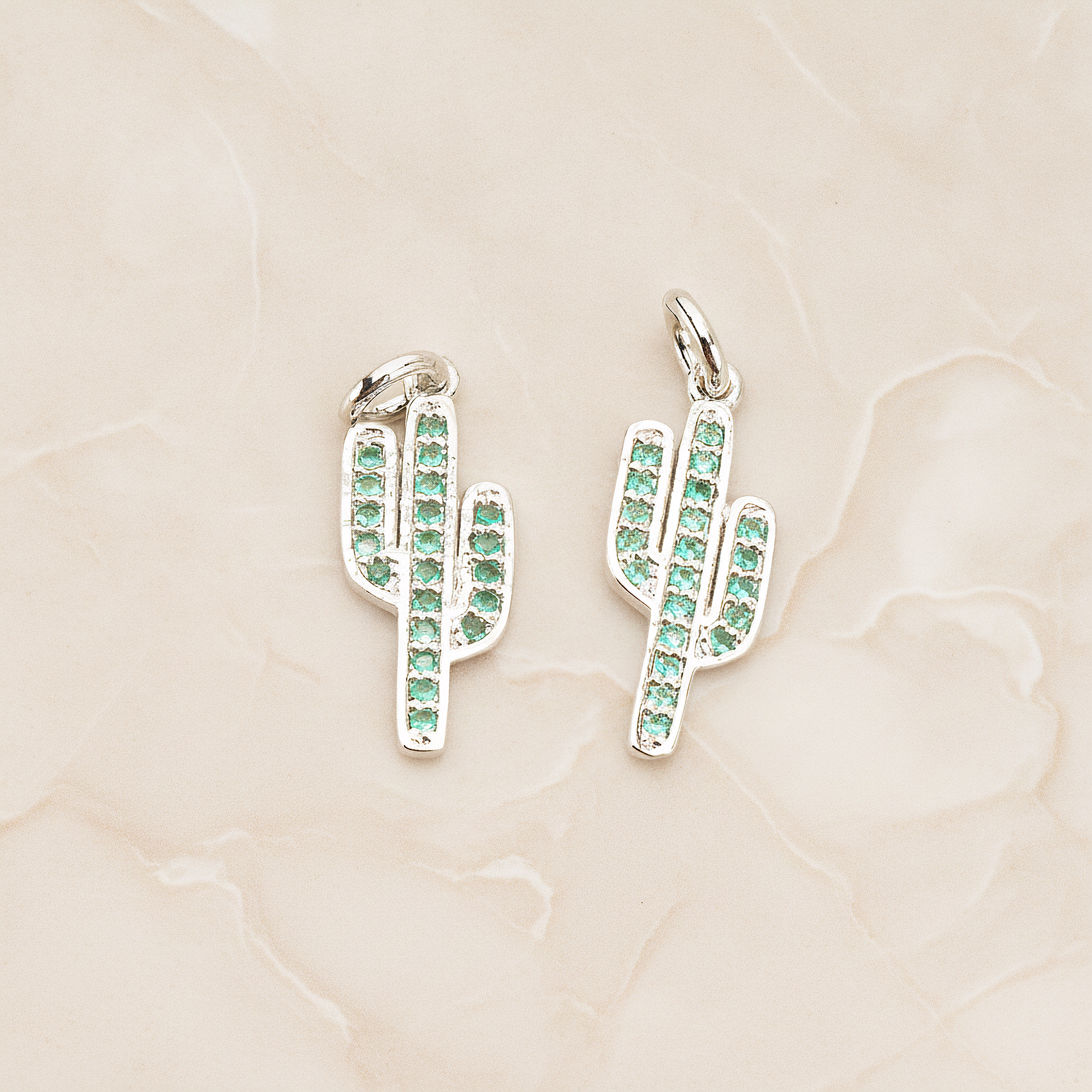 Green Cubic Zirconia Setting Cactus Pendant, 1 Pc on warm marble background (PD.1700)