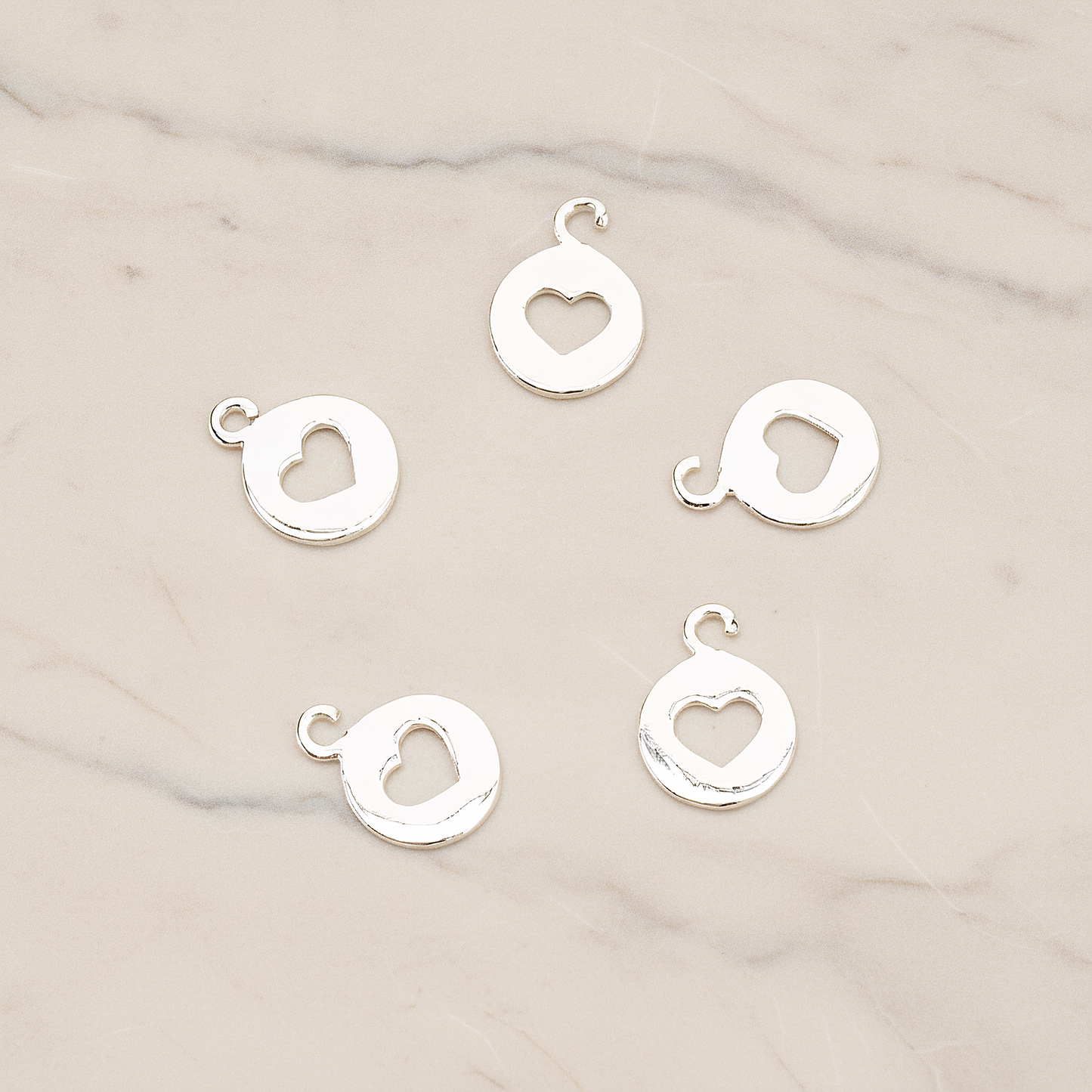 Heart Hole Pendant, 2 Pc on warm marble background (PD.1701-01)