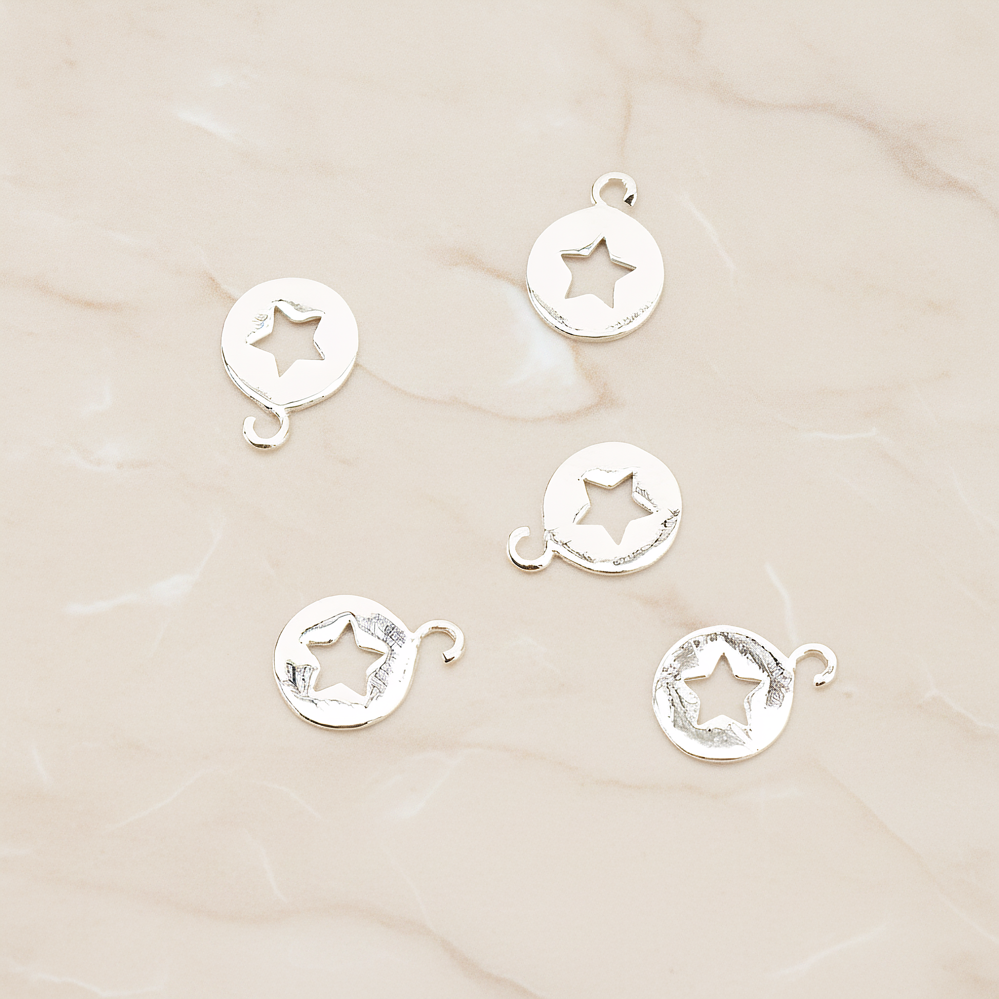 Star Hole Pendant, 2 Pc on warm marble background (PD.1701-02)