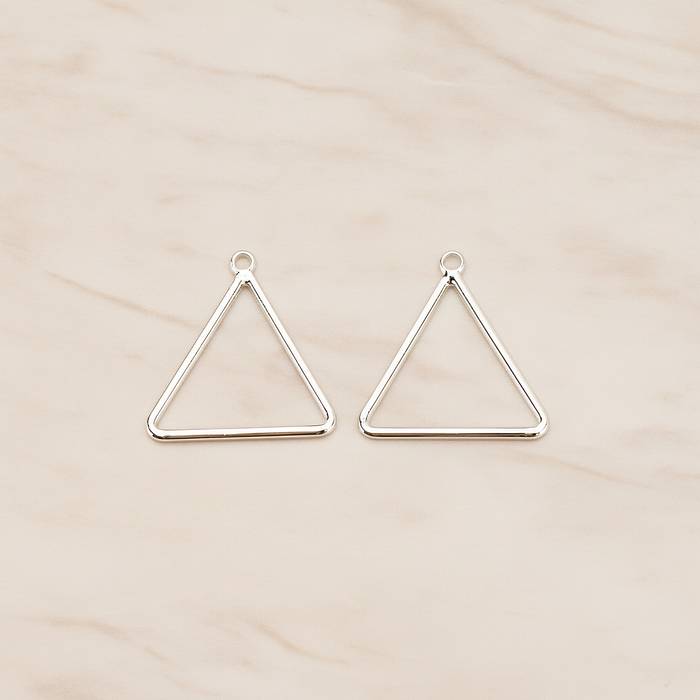 Simple Triangle Link Pendant, 4 Pc on warm marble background (PD.1709)