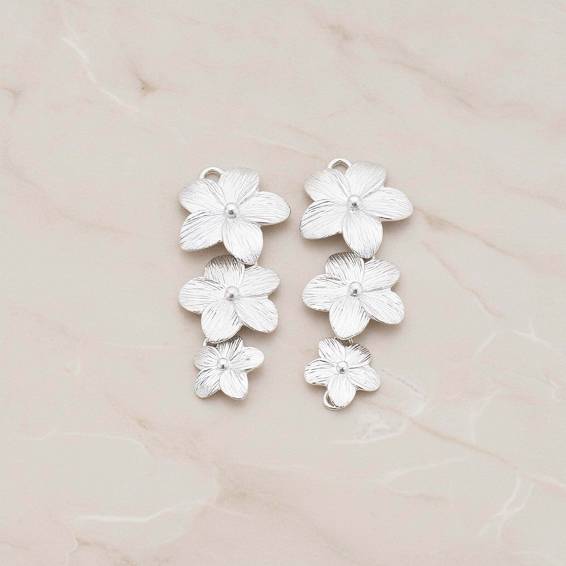 Five Petal Triple Flower Pendant, 2 Pc on warm marble background (PD.178)