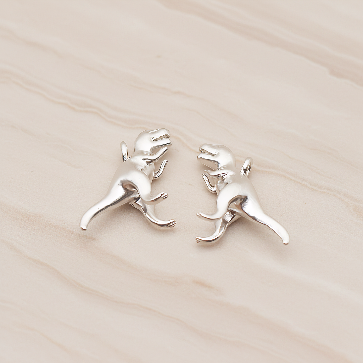 Tyrannosaurus, Dinosaur Pendant, 2 Pc on warm marble background (PD.1798)