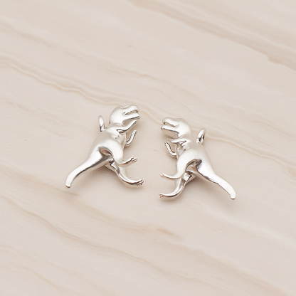 Tyrannosaurus, Dinosaur Pendant, 2 Pc on warm marble background (PD.1798)