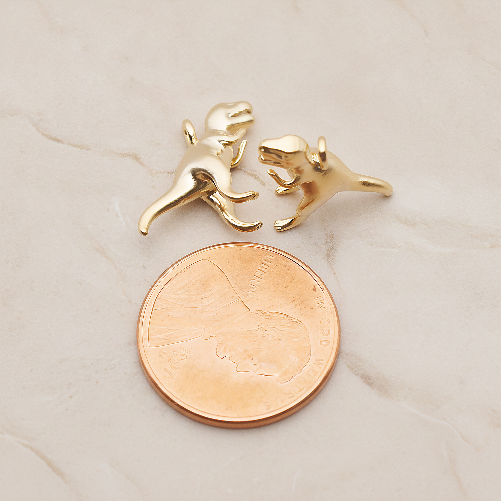 Tyrannosaurus, Dinosaur Pendant, 2 Pc on warm marble background (PD.1798)