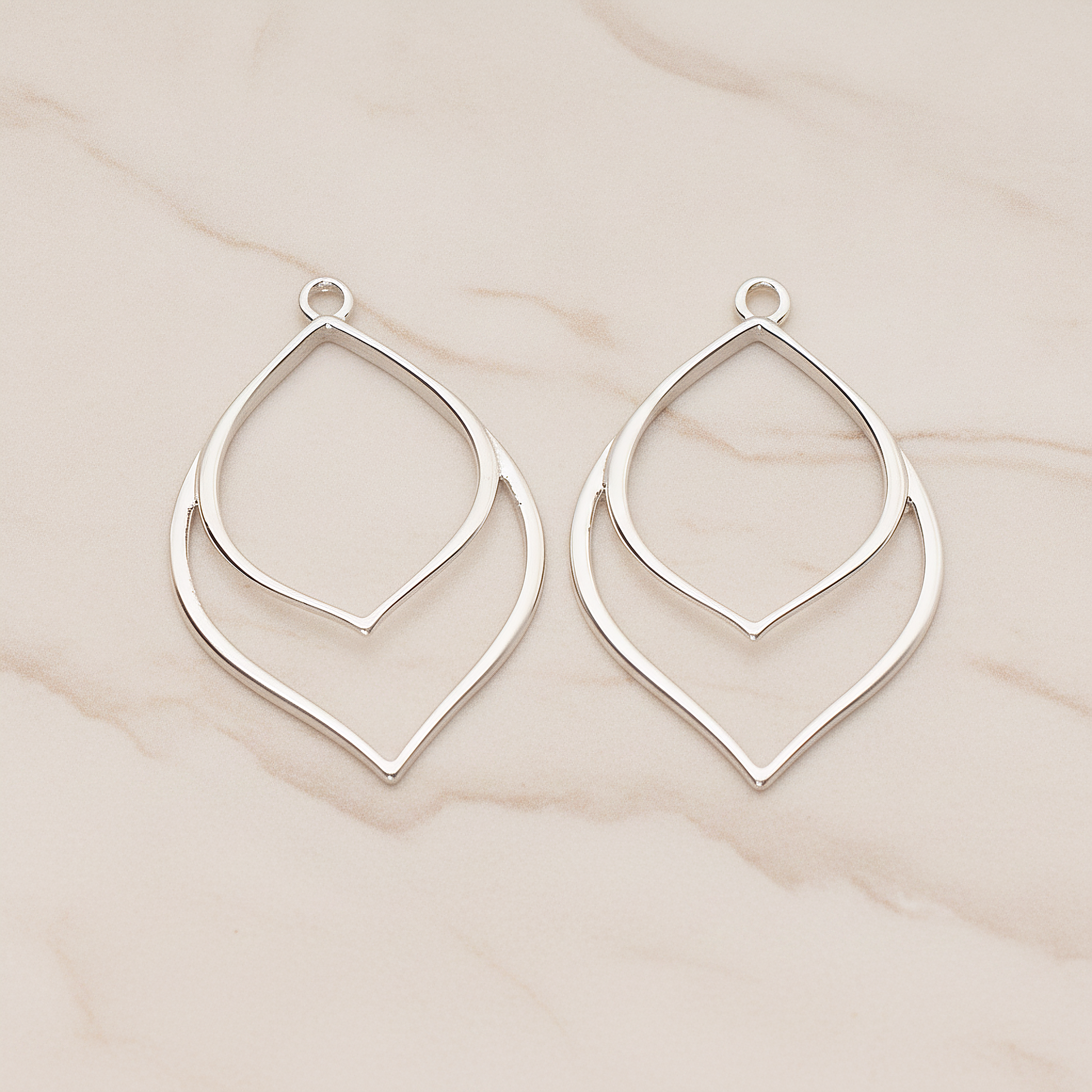 Flower Line Leaf Pendant, 2 Pc on warm marble background (PD.1802)