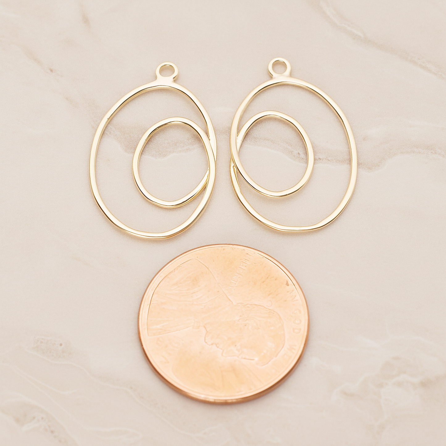 Line Two Oval Pendant, 2 Pc on warm marble background (PD.1803)