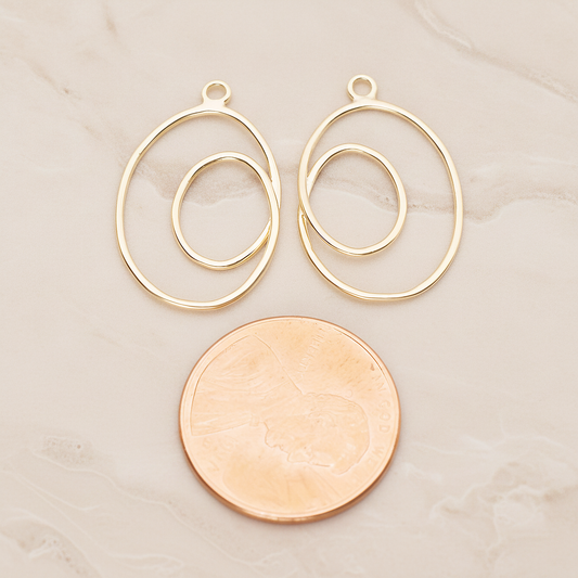 Line Two Oval Pendant, 2 Pc on warm marble background (PD.1803)