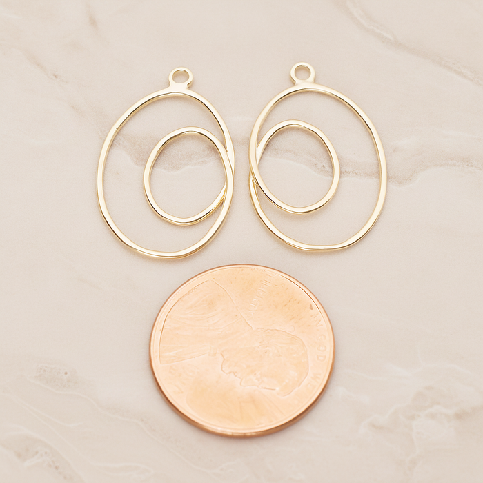 Line Two Oval Pendant, 2 Pc on warm marble background (PD.1803)