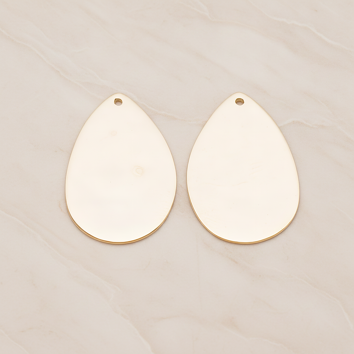 Large Teardrop Stamped Hammered Pendant, 2 Pc on warm marble background (PD.1826-02)
