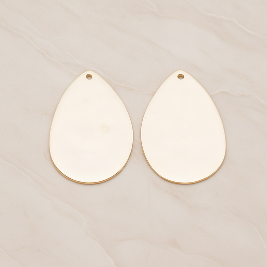 Large Teardrop Stamped Hammered Pendant, 2 Pc on warm marble background (PD.1826-02)
