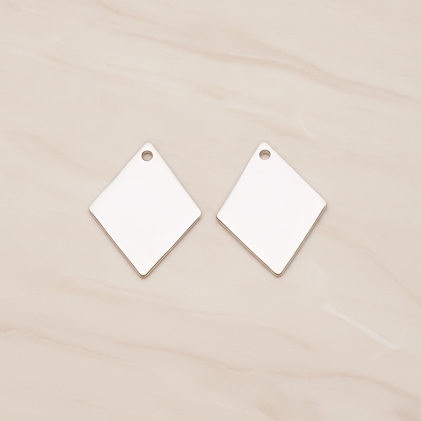Small Rhombus Stamped Hammered Pendant, 2 Pc on warm marble background (PD.1827-01)