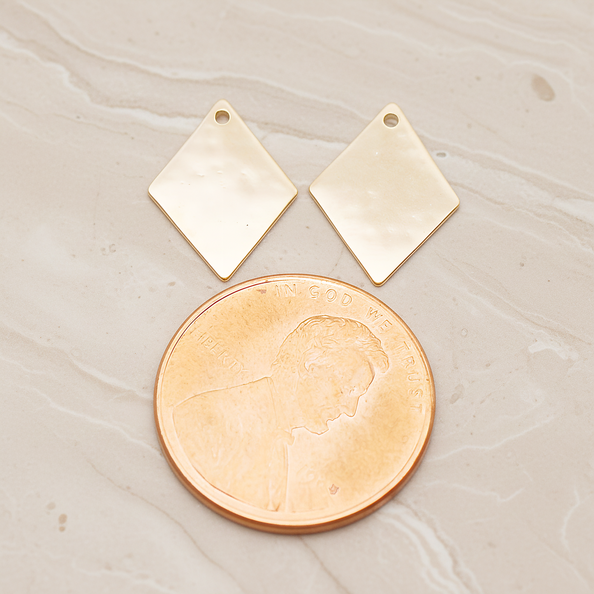 Small Rhombus Stamped Hammered Pendant, 2 Pc on warm marble background (PD.1827-01)