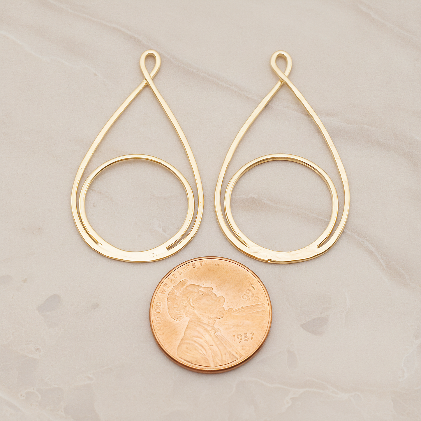 Dubble Round Teardrop Pendant, 2 Pc on warm marble background (PD.1828)