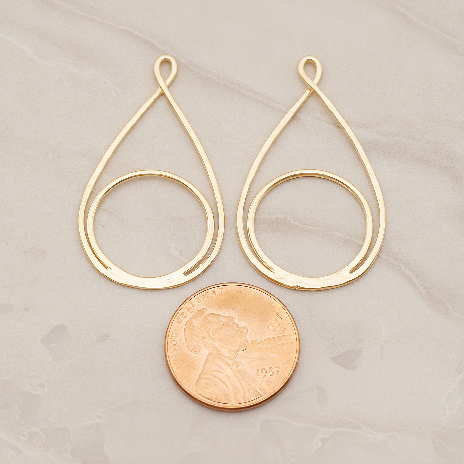 Dubble Round Teardrop Pendant, 2 Pc on warm marble background (PD.1828)