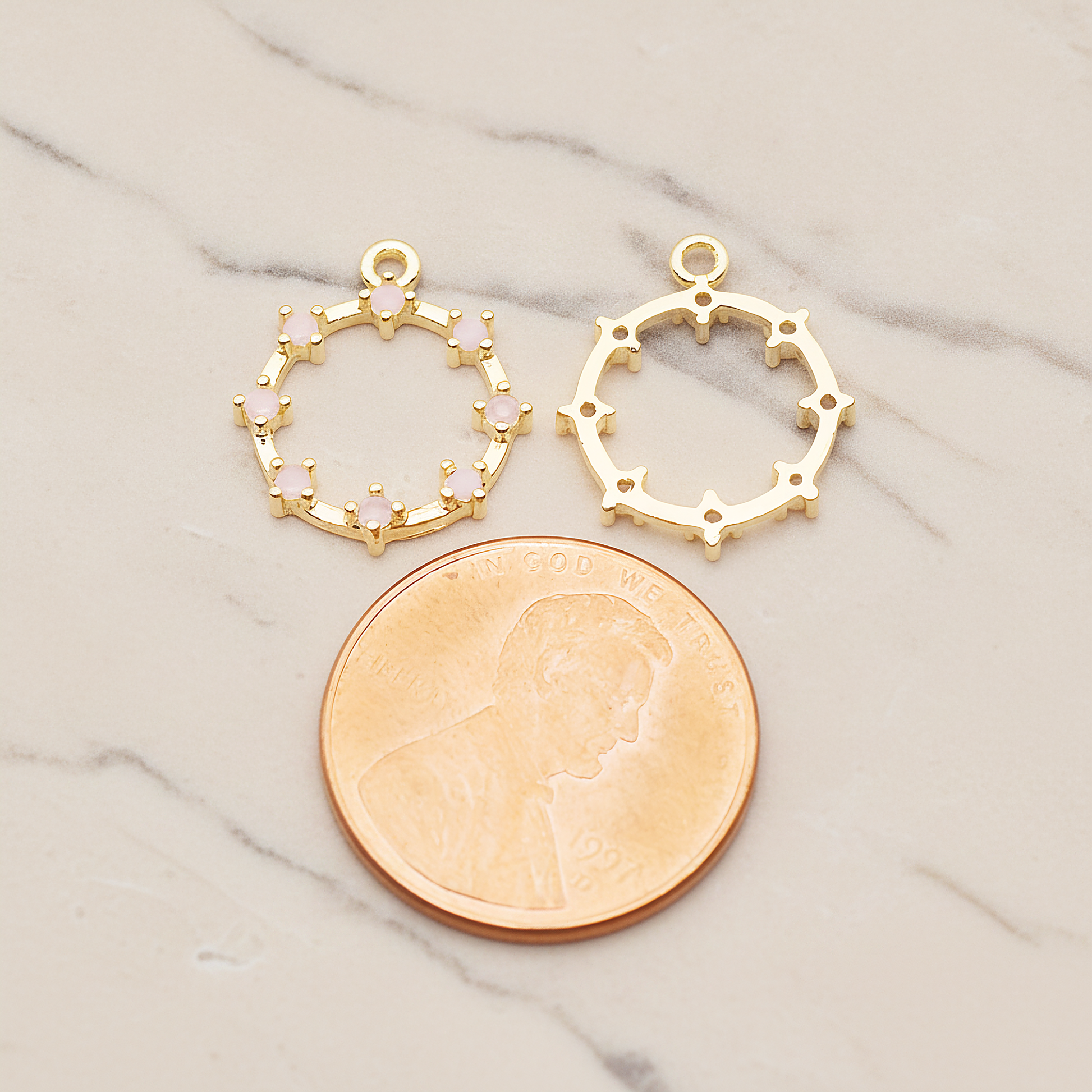 Crown of Beauty Round Cubic Pendant, 2 Pc on warm marble background (PD.1840)