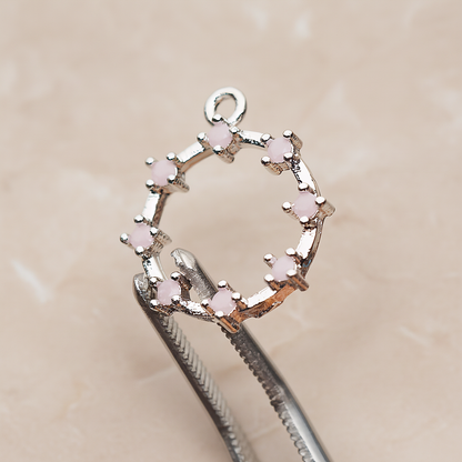 Crown of Beauty Round Cubic Pendant, 2 Pc on warm marble background (PD.1840)