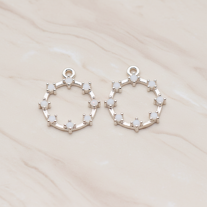Crown of Beauty Round Cubic Pendant, 2 Pc on warm marble background (PD.1840)