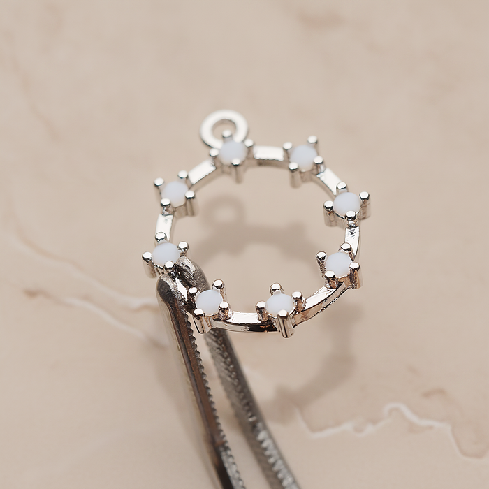Crown of Beauty Round Cubic Pendant, 2 Pc on warm marble background (PD.1840)