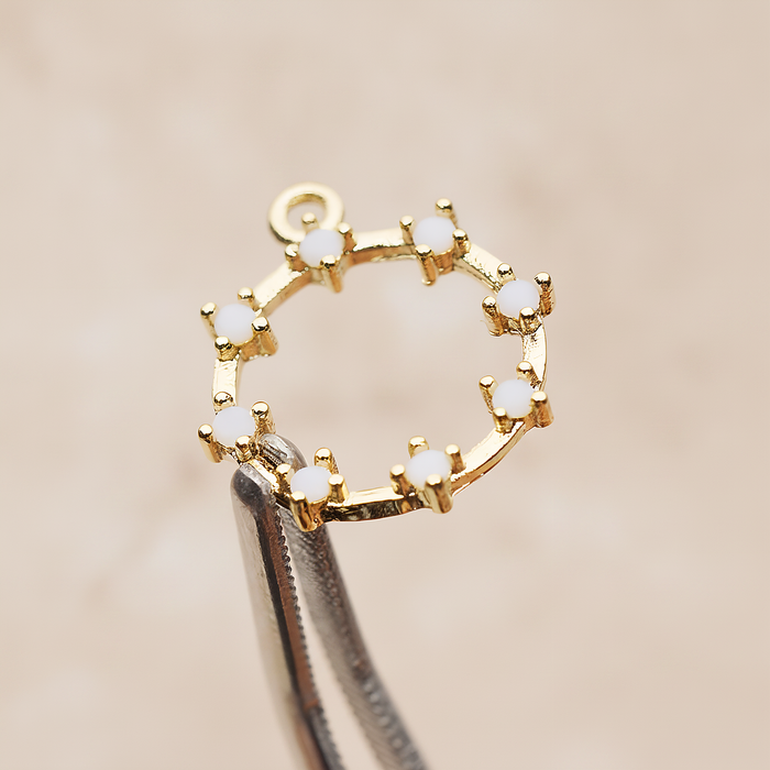 Crown of Beauty Round Cubic Pendant, 2 Pc on warm marble background (PD.1840)