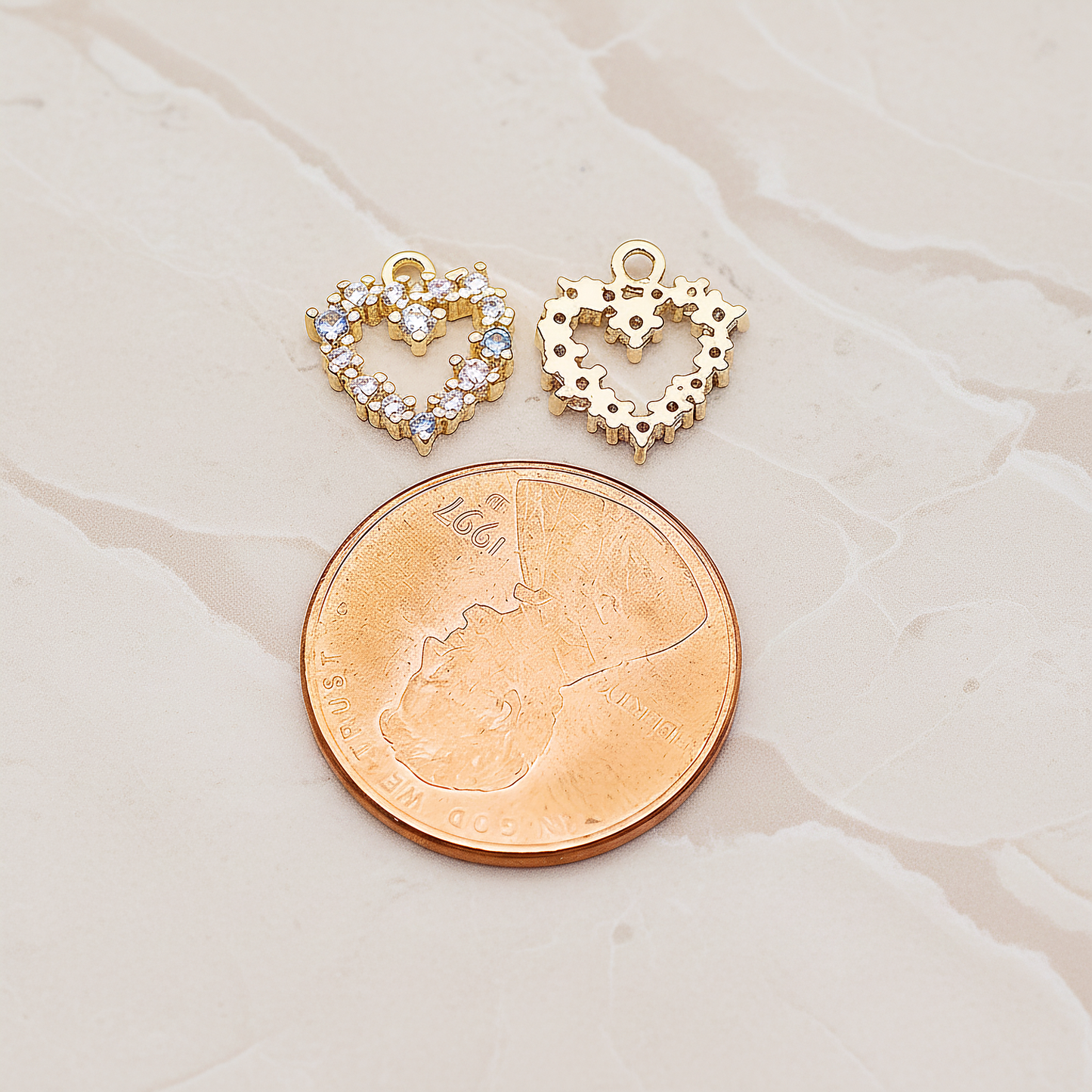 Small Heart Cubic Pendant, 2 Pc on warm marble background (PD.1845)