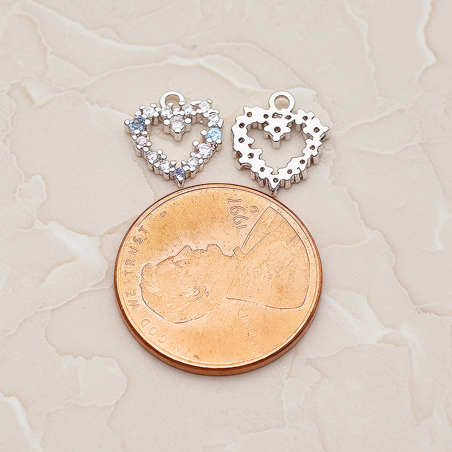 Small Heart Cubic Pendant, 2 Pc on warm marble background (PD.1845)