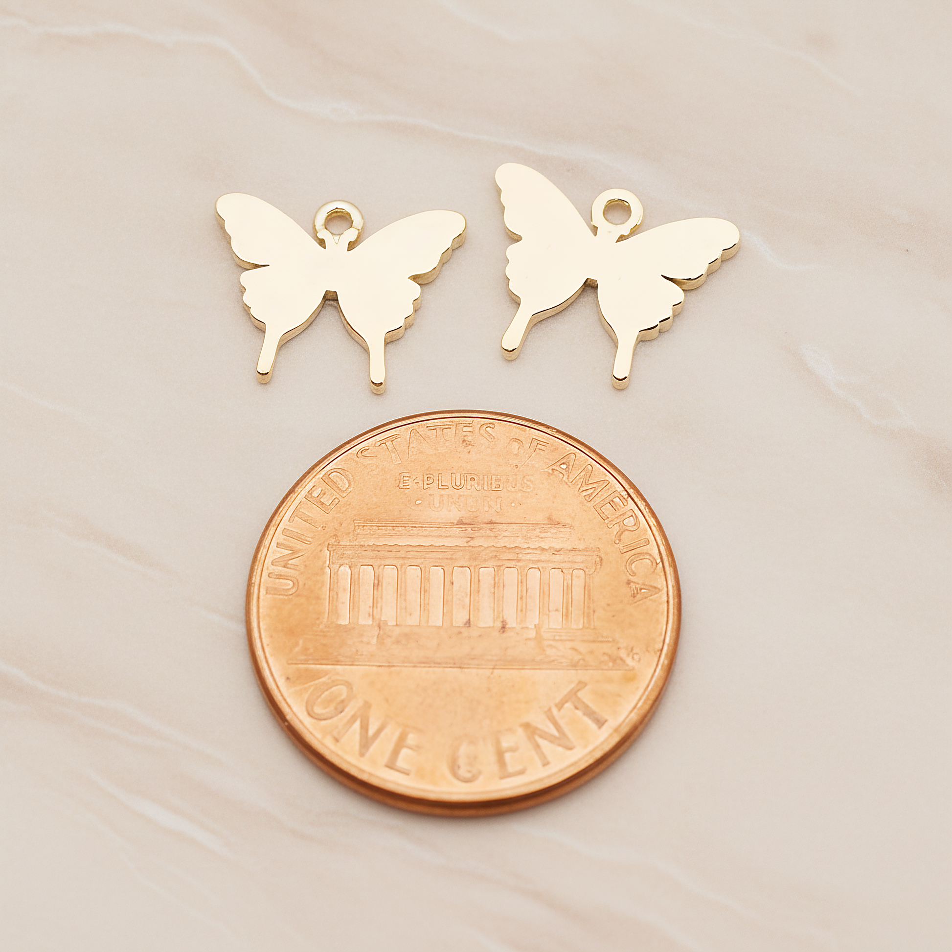 Simple Flat Butterfly Pendant, 2 Pc on warm marble background (PD.1880)