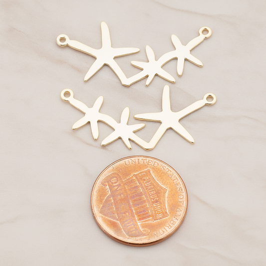 Triple Starfish Linked Pendant, 2 Pc on warm marble background (PD.189)
