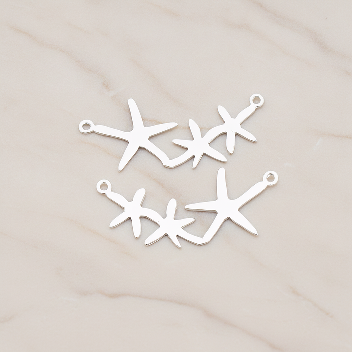 Triple Starfish Linked Pendant, 2 Pc on warm marble background (PD.189)