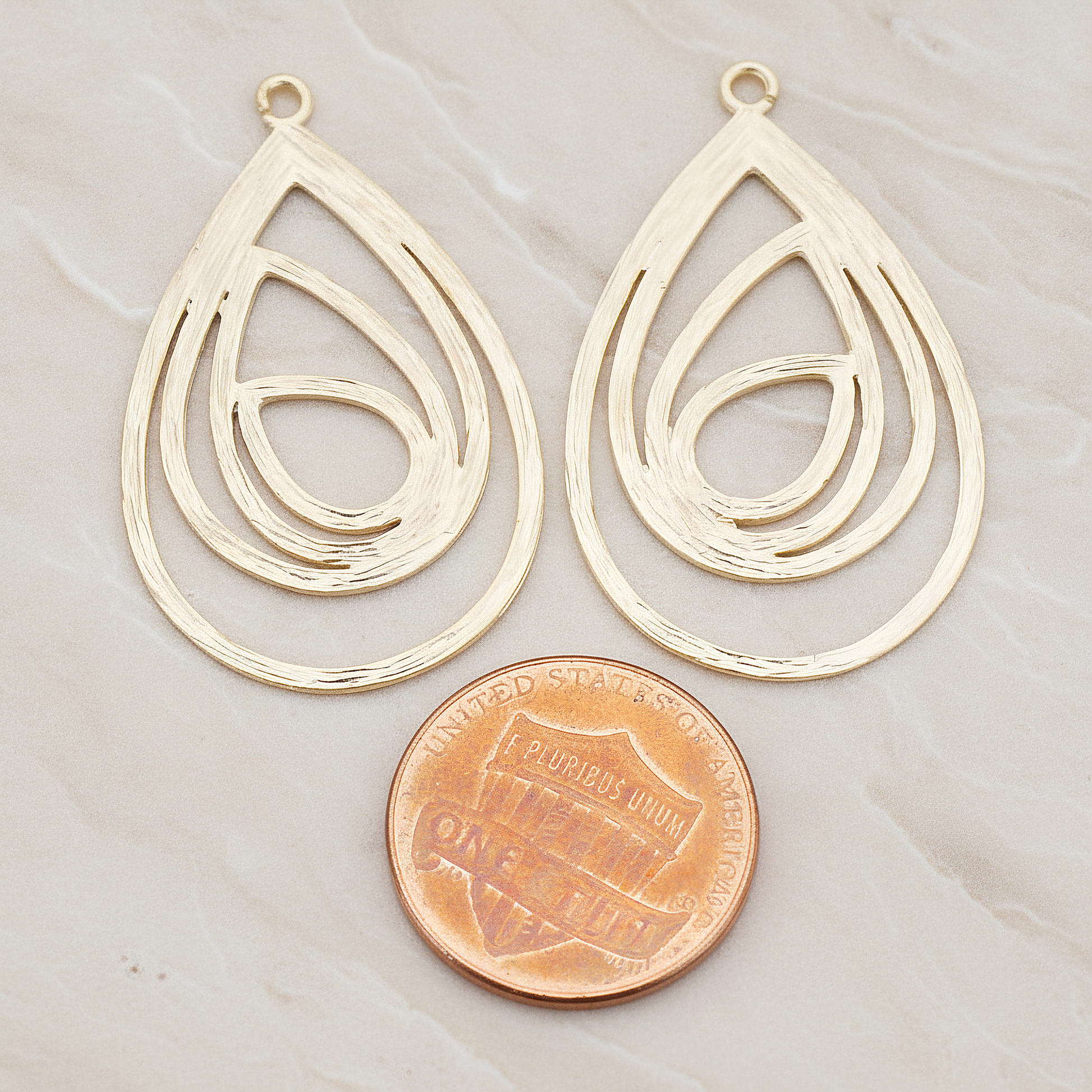 Multiple Teardrop Pendant, 2 Pc on warm marble background (PD.190)