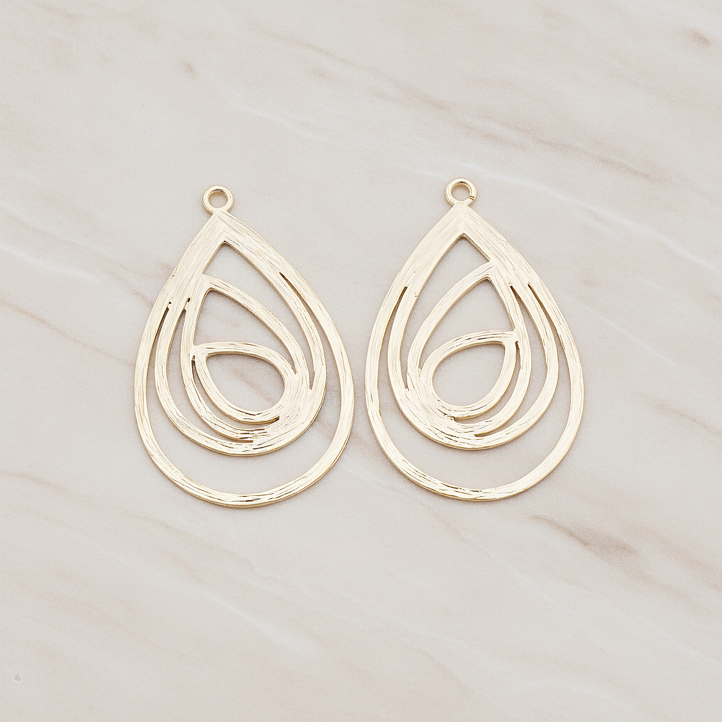 Multiple Teardrop Pendant, 2 Pc on warm marble background (PD.190)