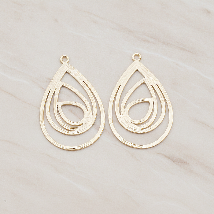 Multiple Teardrop Pendant, 2 Pc on warm marble background (PD.190)