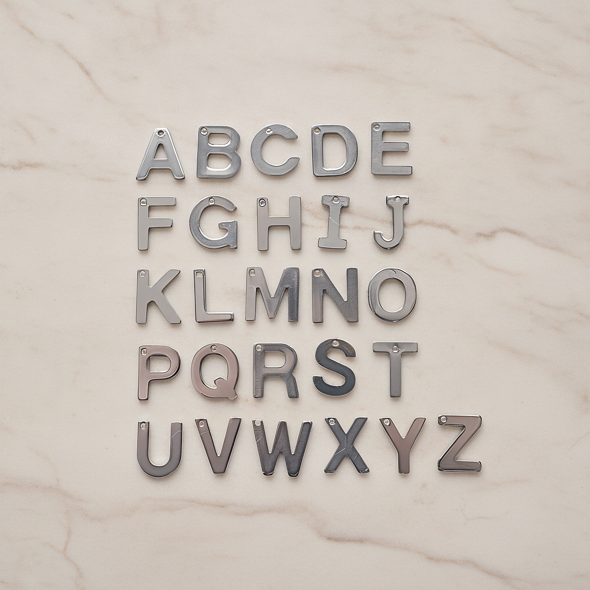 Surgical Steel Pendant Initials Pendant, 2 Pc on warm marble background (PD.1941)