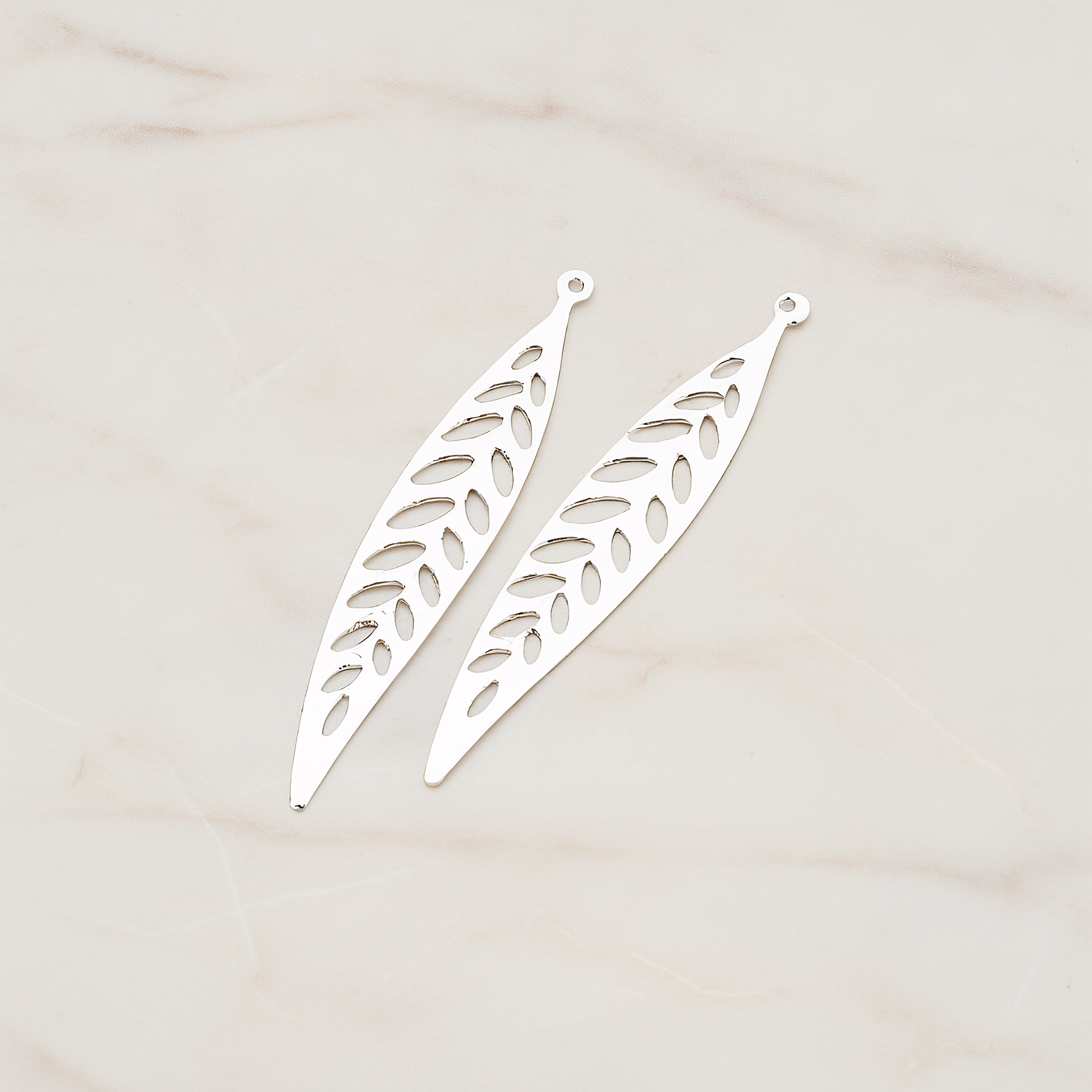 Pointed Linear Narrow Leaf Pendant, 4 Pc on warm marble background (PD.202)