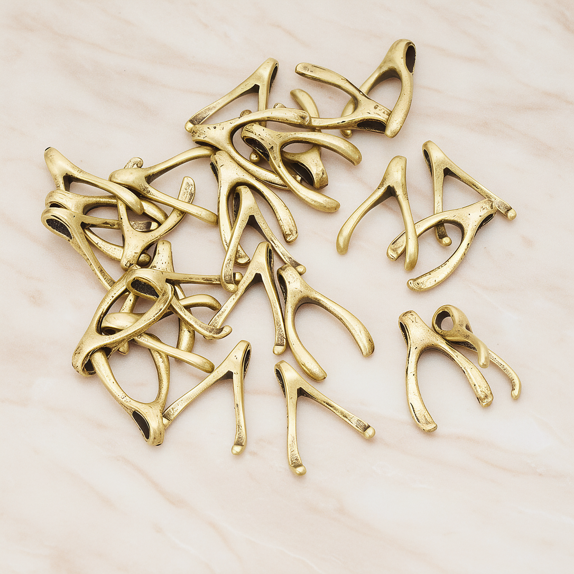 SMALL Wishbone Pendant, 2 Pc on warm marble background (PD.205-01)