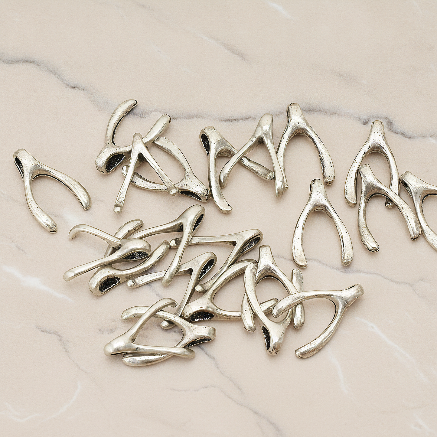 SMALL Wishbone Pendant, 2 Pc on warm marble background (PD.205-01)