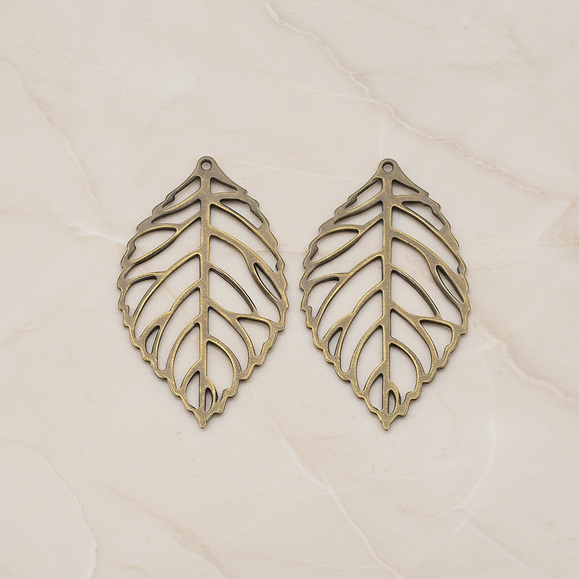SMALL Leaf Pendant, 4 Pc on warm marble background (PD.210-01)