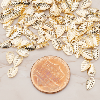 Half Fold Tiny Leaf Charm, 20 Pc on warm marble background (PD.222)