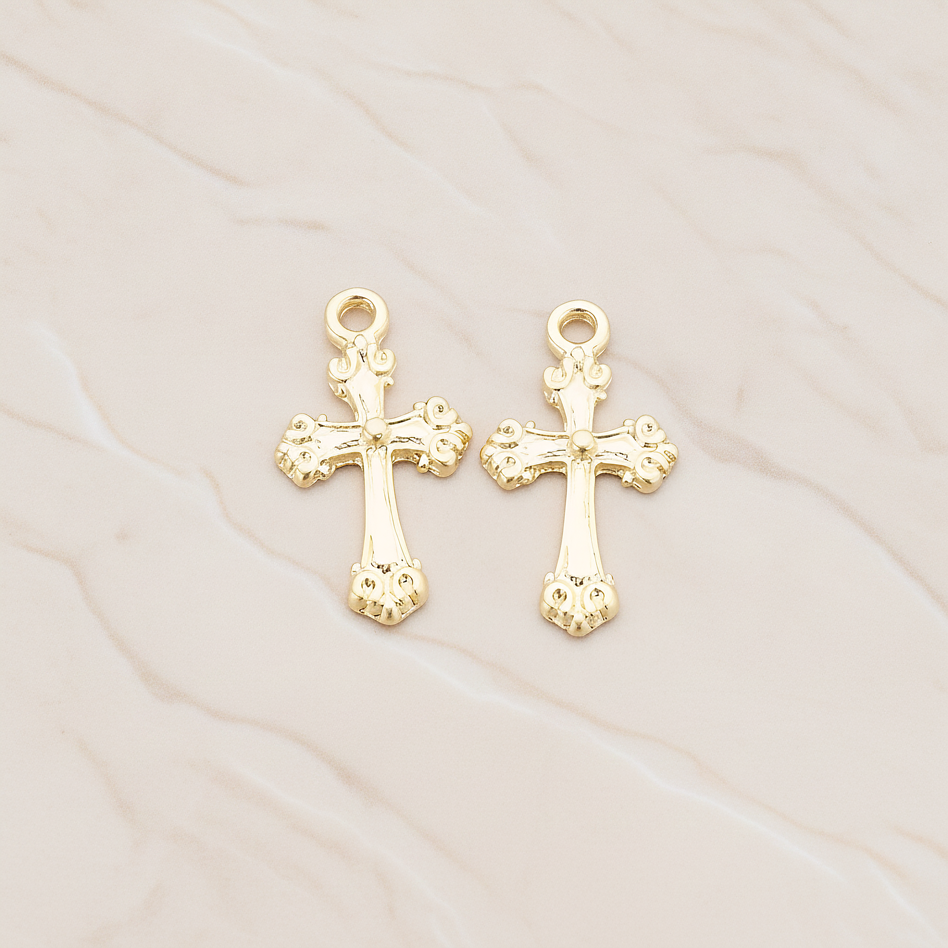 Small Cathedral Cross Pendant, 4 Pc on warm marble background (PD.227)