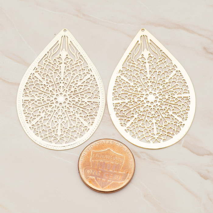 Cathedral Filigree Teardrop Pendant, 2 Pc on warm marble background (PD.229-01)