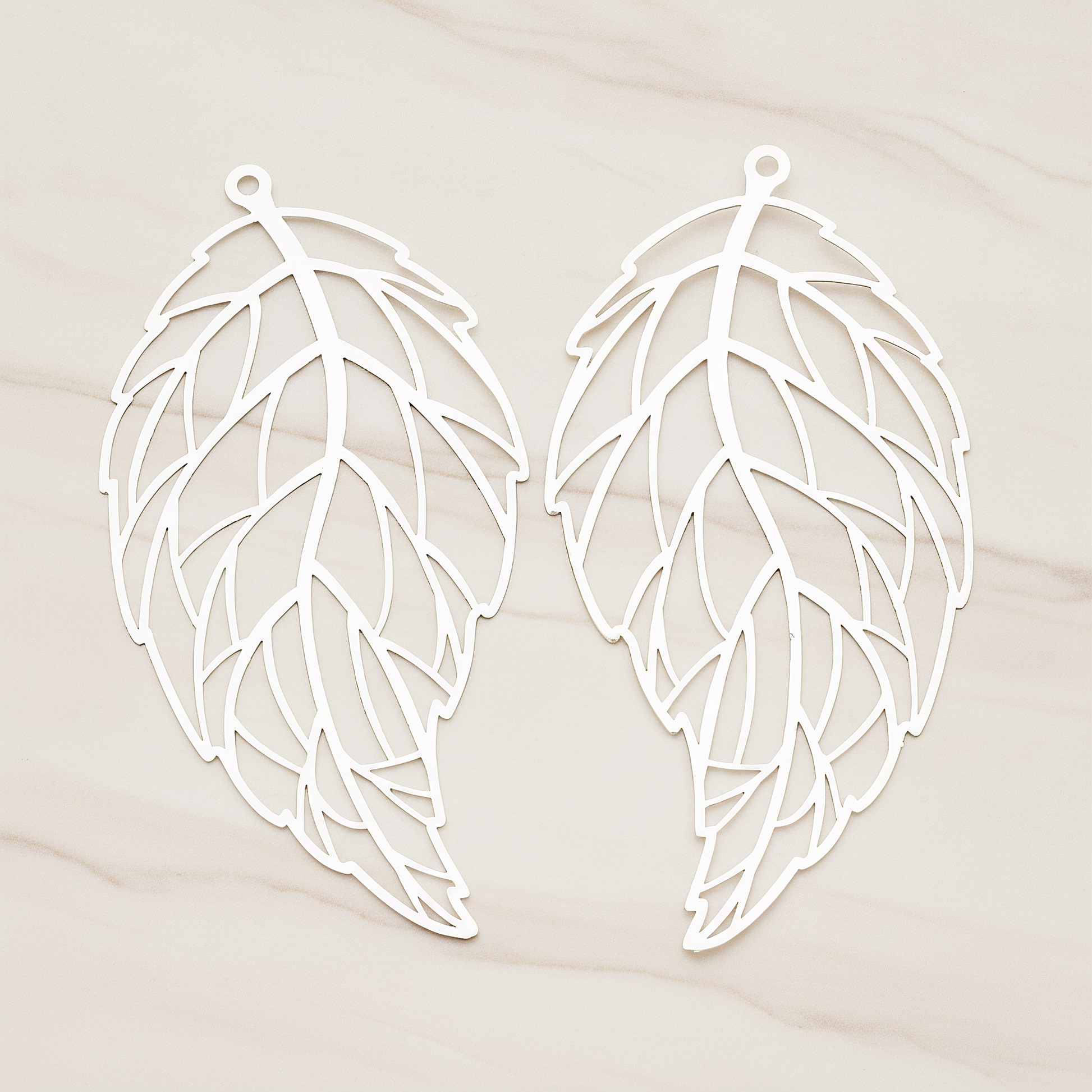 Filigree Vein Leaf Pendant, 2 Pc on warm marble background (PD.235)