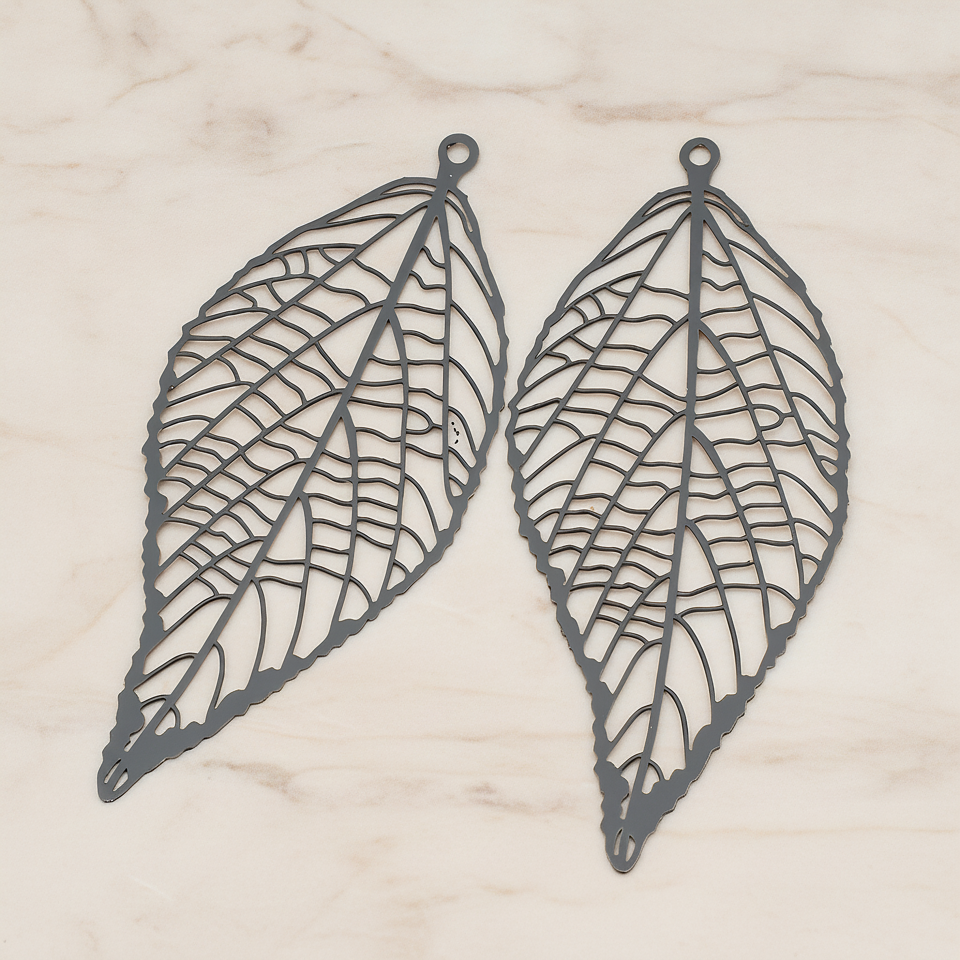 Pressed Filigree Vein Leaf Pendant,, 2 Pc on warm marble background (PD.243)