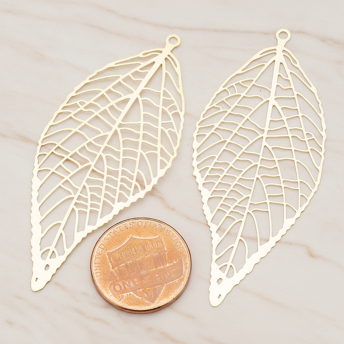 Pressed Filigree Vein Leaf Pendant,, 2 Pc on warm marble background (PD.243)