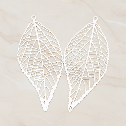 Pressed Filigree Vein Leaf Pendant,, 2 Pc on warm marble background (PD.243)