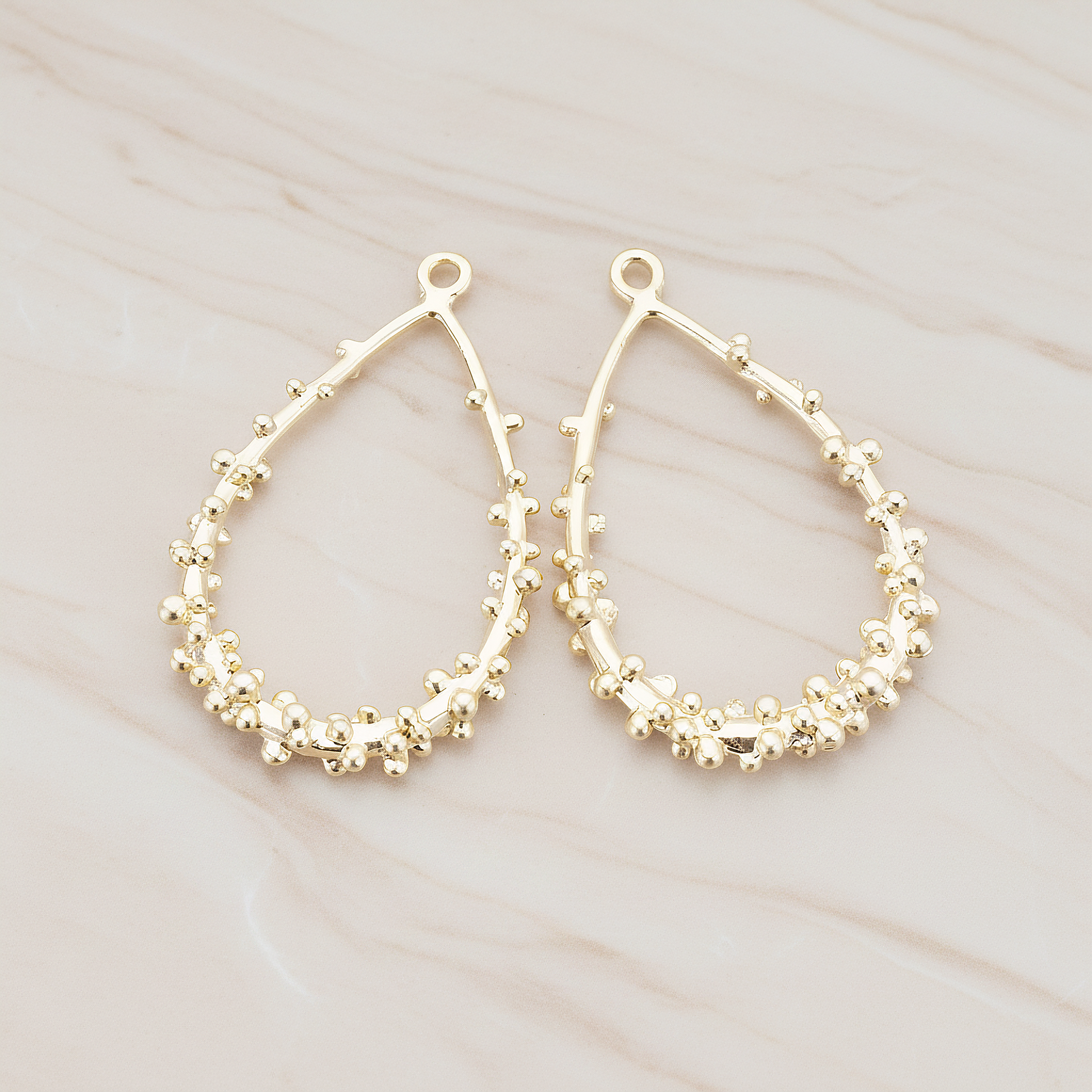 Dotted Teardrop Pendant, 2 Pc on warm marble background (PD.276)