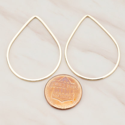 Simple Teardrop Link Pendant, 2 Pc on warm marble background (PD.300-01)